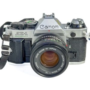 Canon AE‑1 Program 35mm SLR camera with 50mm f/1.8 FD lens in refurbished kit