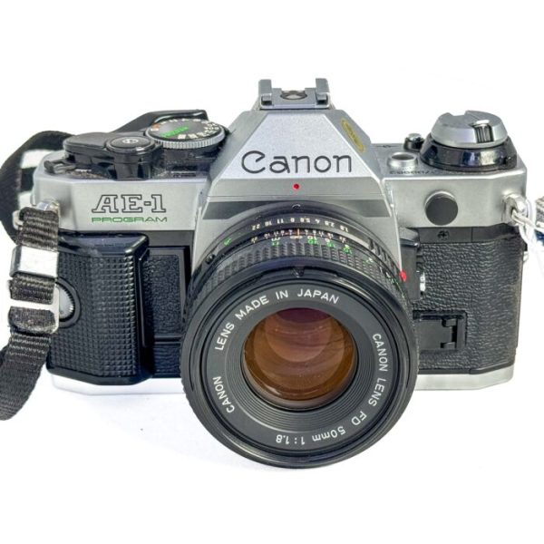 Canon AE‑1 Program 35mm SLR camera with 50mm f/1.8 FD lens in refurbished kit